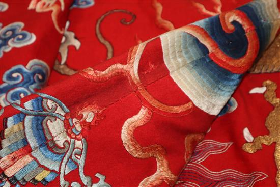 A Chinese embroidered silk dragon wall hanging, early 20th century